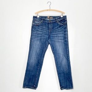 Kut from the Kloth mid rise straight leg jeans. 
Button/zipper closure. Size 12.